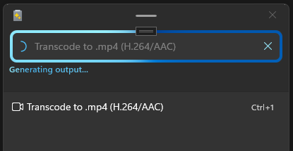 A screenshot of the PowerToys Advanced Paste window processing a transcode operation with an available cancel button.