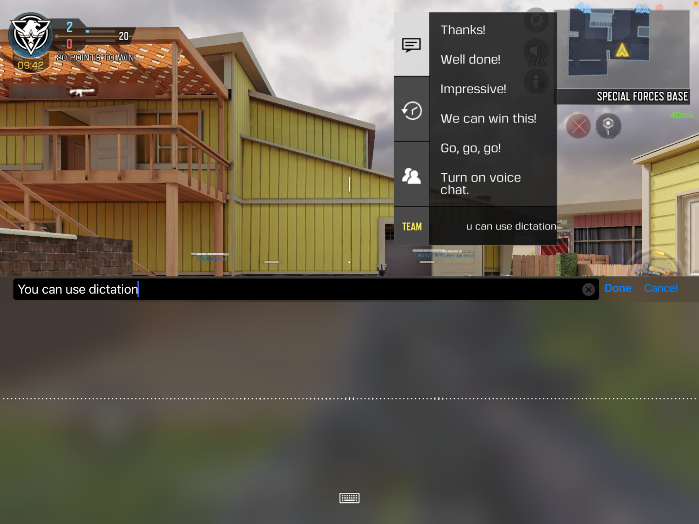 Screen shot of Call of Duty: Mobile where player is using iPad's built in dictation feature to dictate "You can use dictation" into the game's team chat during an online match.