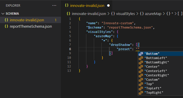 Screenshot of using the report theme schema to identify available formatting options.  The autocomplete menu within Visual Studio Code shows available formatting options.